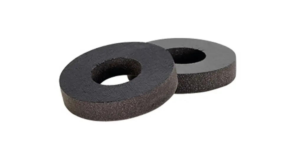 Zwei schwarze Schalldämmeinsätze mit zentralem Loch, geeignet für Heizungsanwendungen. Teil der Vaillant Produktlinie zur Geräuschreduzierung.